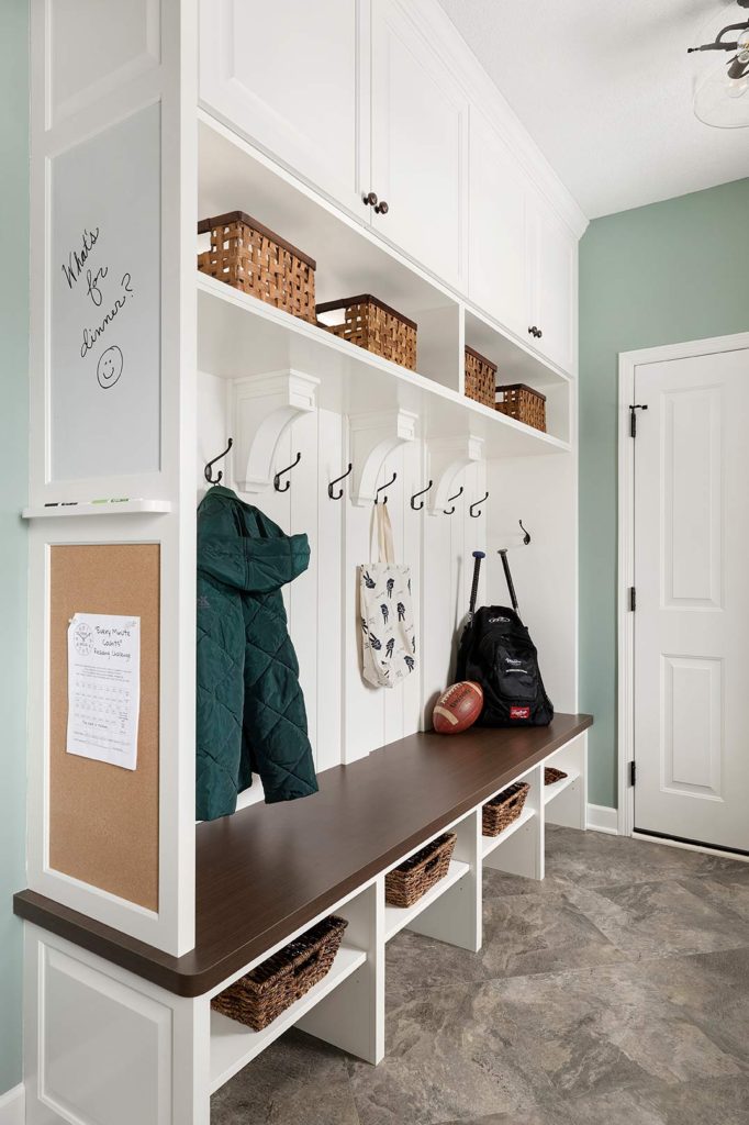 Mudroom with hooks and cubbies. 