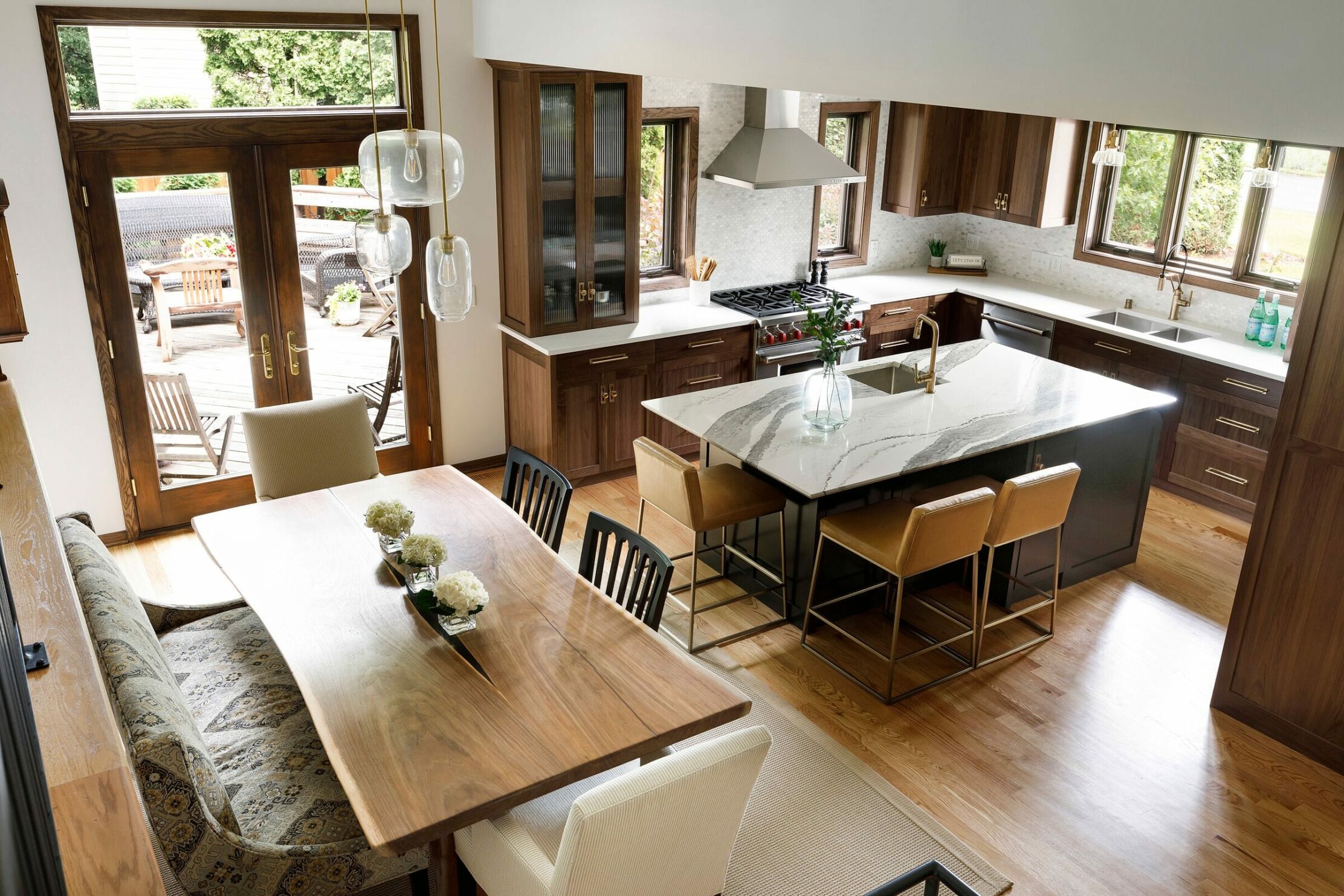 Kitchen with multiple seating areas.