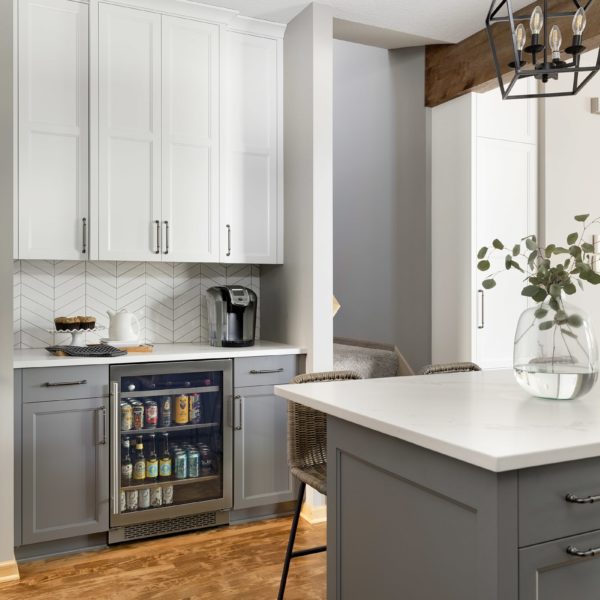 Gray and white kitchen cabinetry.