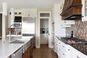 A newly renovated kitchen with eye-catching colors and countertops.