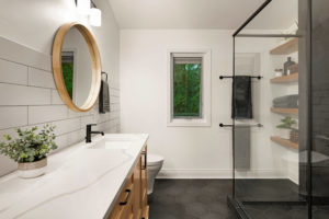 Bathroom remodel with matte black fixtures.