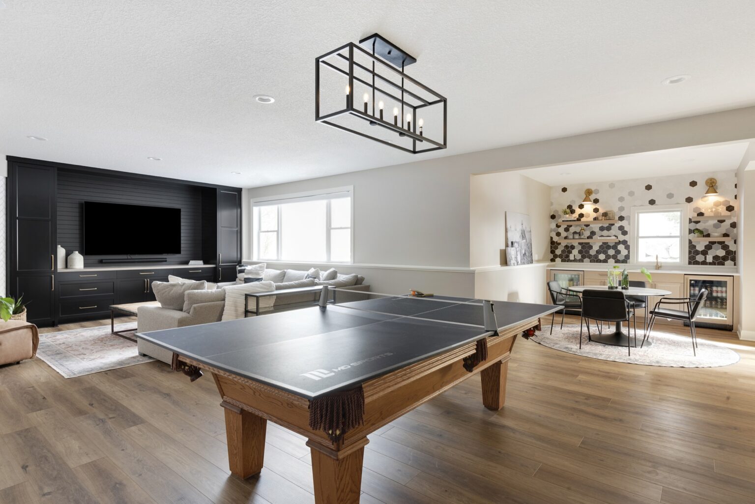 Rosemount lower level remodel with pool table and entertainment center