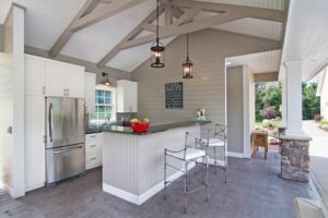 Blended indoor outdoor living space with full kitchen. JBDB has plenty of backyard remodeling ideas. 