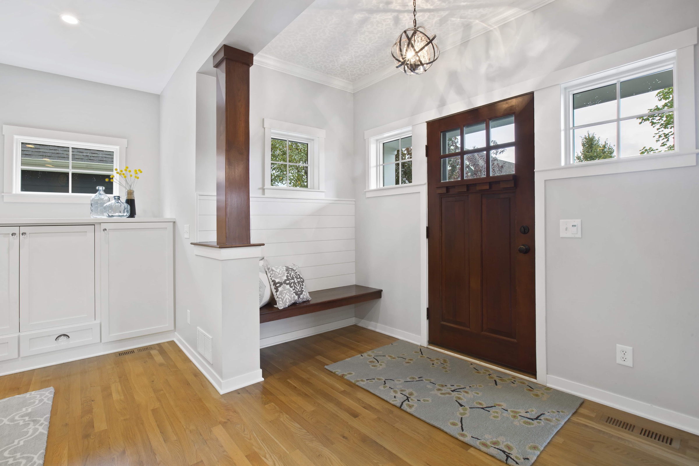 Interior entryway with modern baseboards.