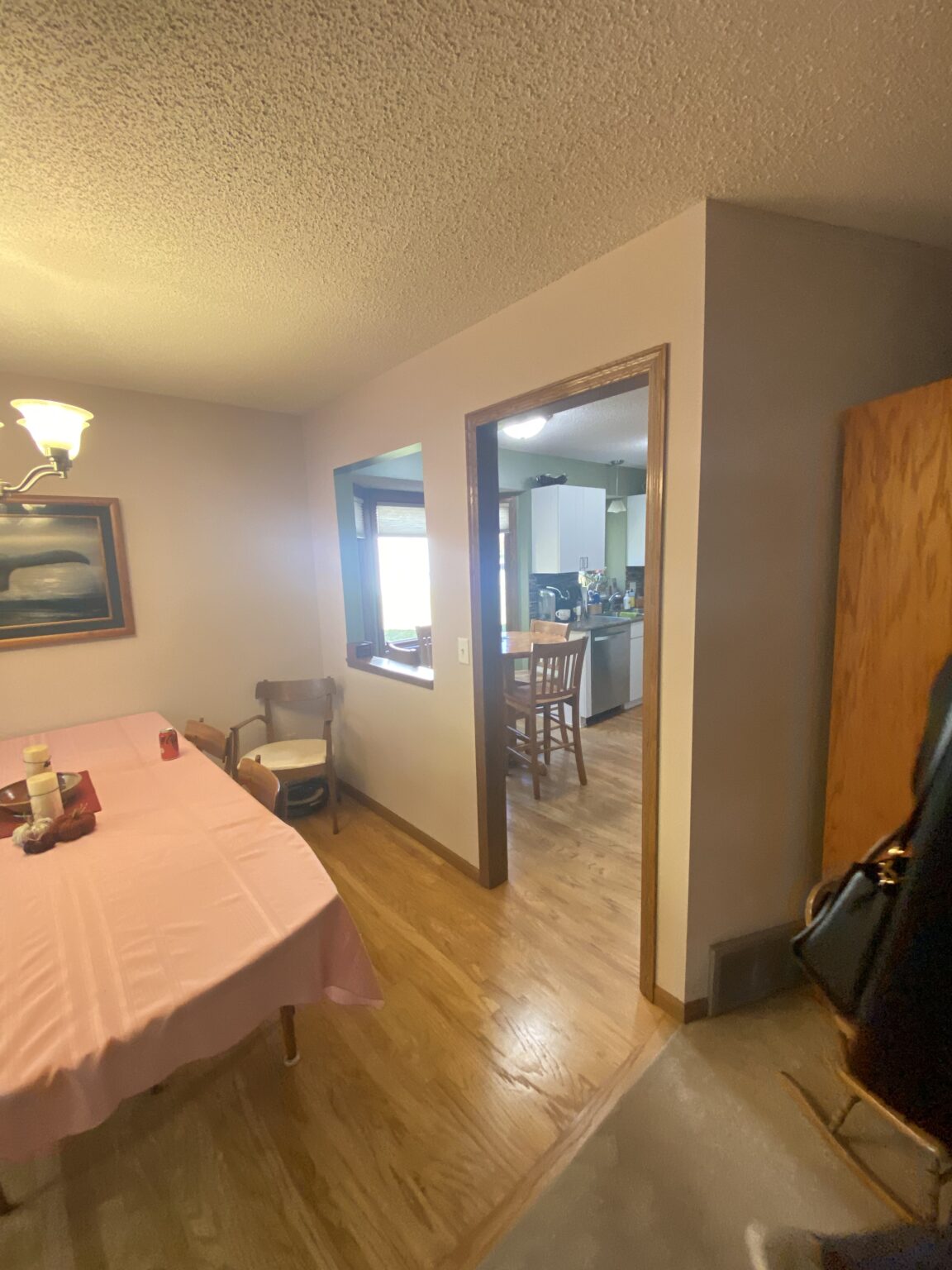 Before image of a kitchen with wooden trim