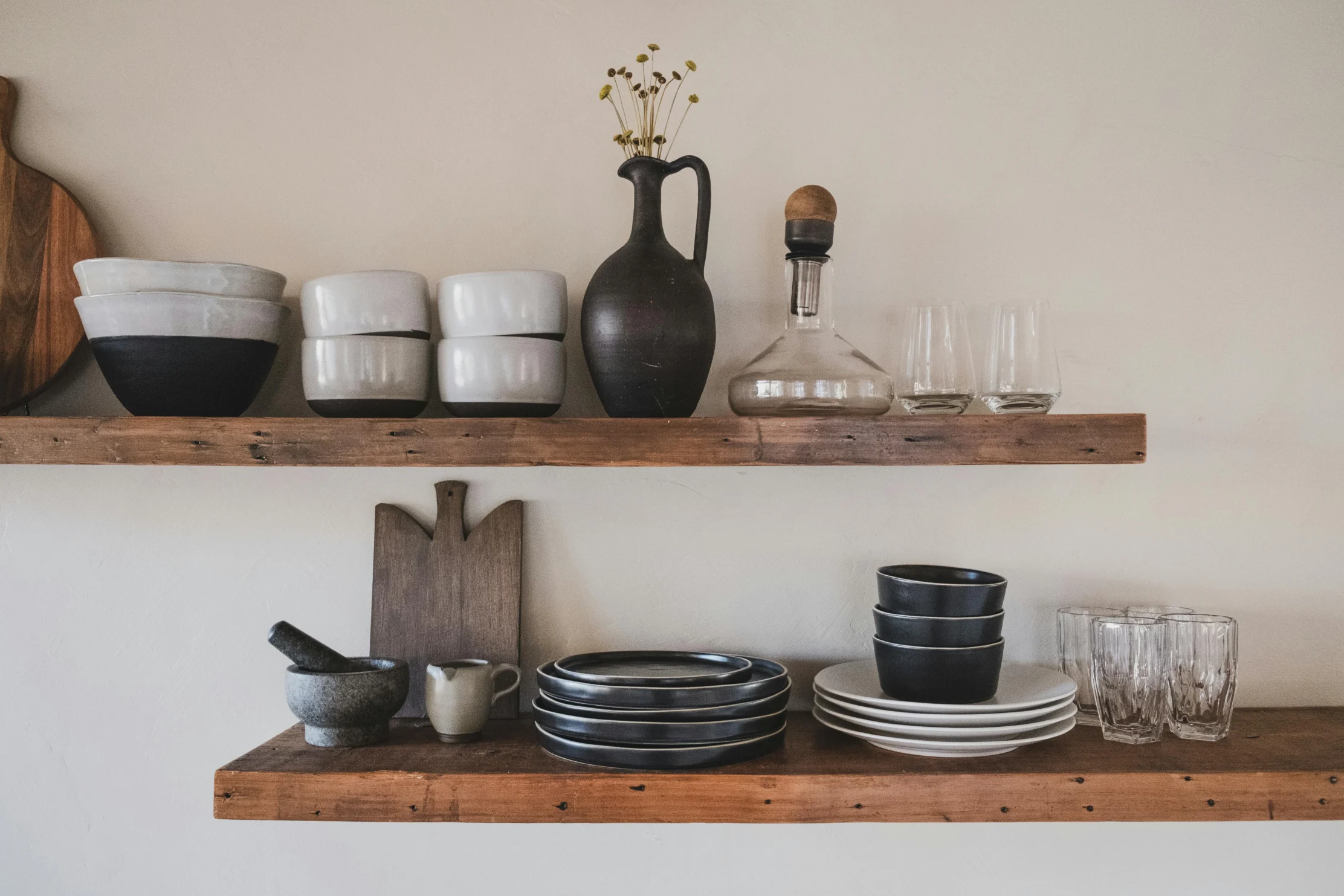 Open kitchen shelves with dishes and serveware